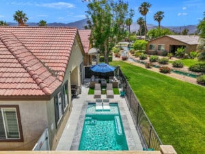 Aerial of the backyard pool and golf course at Indio Oasis House, a Indio, CA vacation rental