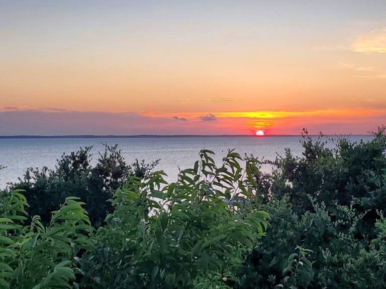 Sunset over the sound from the yard at Duck Blind, a Duck, NC vacation rental