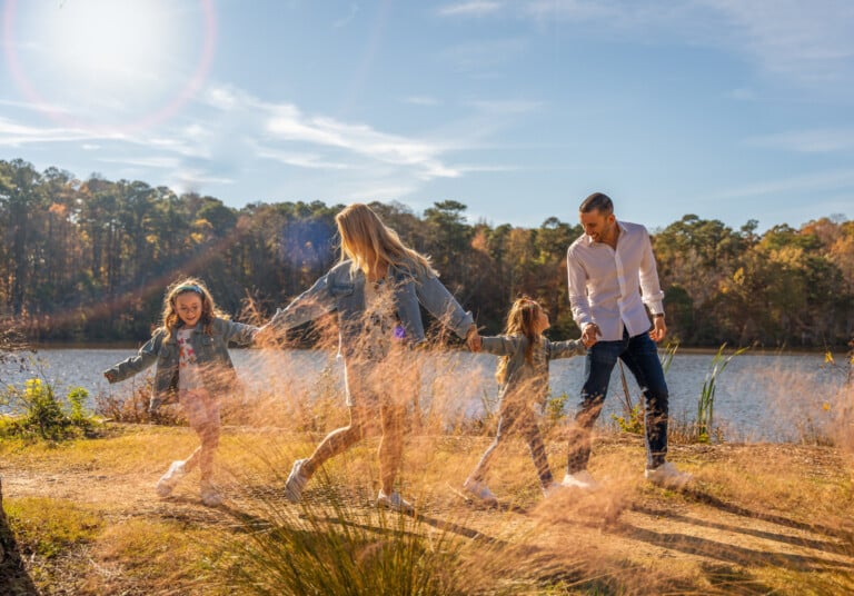 Family splashing at the lake shore