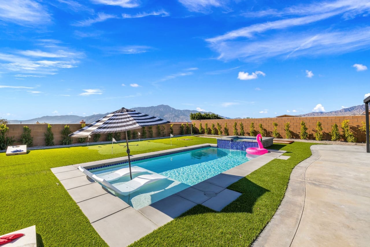 Pool with mountain views at Salida Del Sol, Desert Hot Springs CA