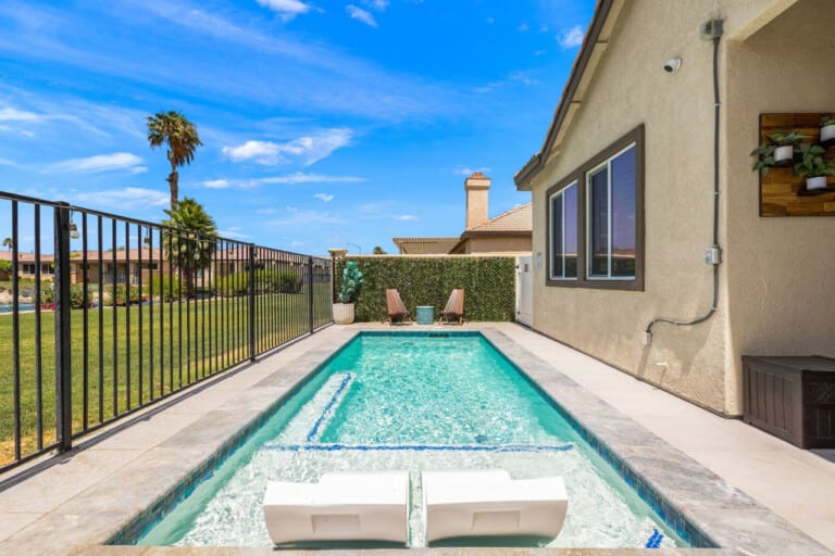 Private pool with golf course views and fence at Indio Oasis House, a Indio, CA vacation rental