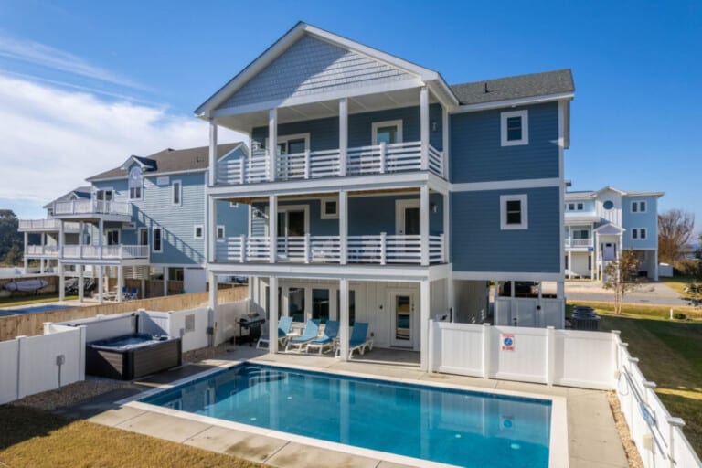 Rear exterior with private pool and decks at Soundside Serenity at Cruz Bay, a Corolla, NC vacation rental