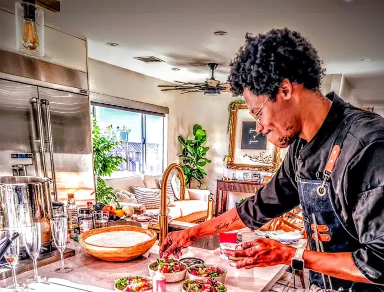 Private chef preparing a meal in a vacation rental kitchen